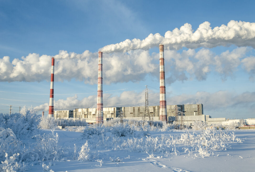 Gas power station in cold winter landscape